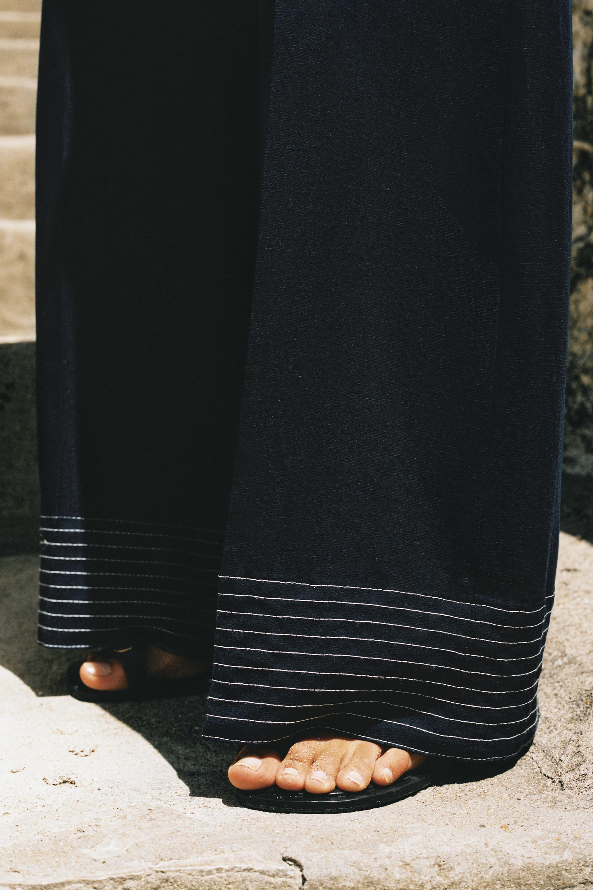 CONTRAST PIPING HALTER JUMPSUIT